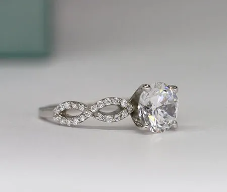 Camellia - Round Moissanite Engagement Ring