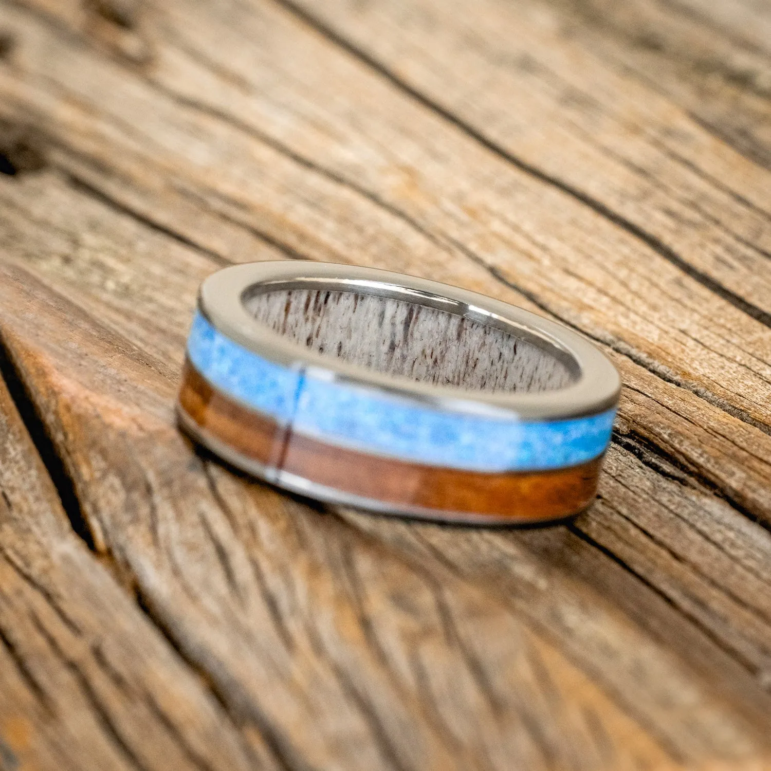 "DYAD" - KOA WOOD & BLUE OPAL WEDDING RING FEATURING AN ANTLER LINED BAND - BLACK ZIRONIUM - SIZE 10 3/4