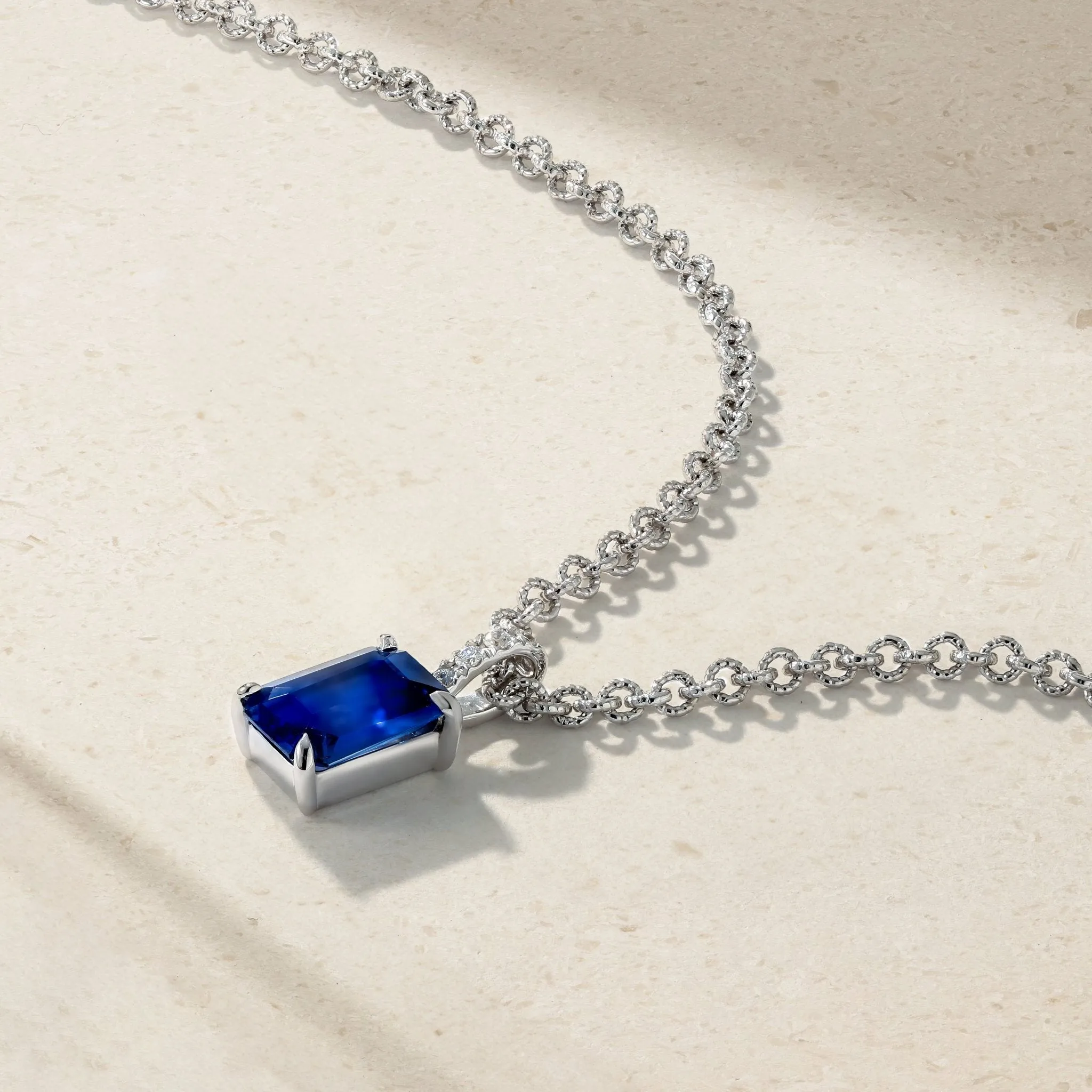 Simple Solitaire Emerald Cut Sapphire Pendant